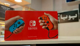 کنسول بازی نینتندو سوییچ کپی خور قرمز آبی Nintendo Switch در حد فول لوازم پویا گیم لند